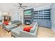 Bright and spacious living room with hardwood floors, comfortable seating, and a cozy fireplace at 2415 Jasper Patterson Dr, Johns Island, SC 29455