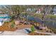 Community wooden playground featuring a boat-themed structure with a slide, climbing wall, and swing set at 2415 Jasper Patterson Dr, Johns Island, SC 29455