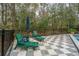 Backyard patio with comfortable lounge chairs, offering a peaceful retreat next to the inviting pool at 2415 Jasper Patterson Dr, Johns Island, SC 29455