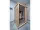 Modern wooden sauna with glass door and benches, designed for relaxation and wellness at 2415 Jasper Patterson Dr, Johns Island, SC 29455