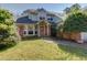 Charming two-story home with a well-maintained front yard and traditional architectural details at 2612 Morning Dove Ln, Charleston, SC 29414