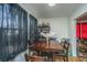 Cozy dining room featuring a wood table and dark curtains for intimate meals at 2671 Houston St, North Charleston, SC 29405