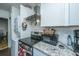 Updated kitchen with stainless steel appliances, granite countertops, and stacked washer/dryer at 2671 Houston St, North Charleston, SC 29405