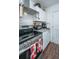 Charming kitchen with updated stainless steel appliances, granite countertops, and modern fixtures at 2671 Houston St, North Charleston, SC 29405