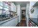 Bright kitchen with updated cabinets, granite countertops, stainless steel appliances, and natural light at 2671 Houston St, North Charleston, SC 29405