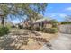 Brick exterior home with mature trees and landscaped front yard for shaded curb appeal at 30 Hunters Forest Dr, Charleston, SC 29414