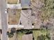 Aerial view of the home showing the roof, driveway, and surrounding landscaping at 303 Gippy Dr, Summerville, SC 29486