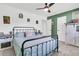Comfortable bedroom with a ceiling fan, coordinating furniture, and a calm and inviting atmosphere at 303 Gippy Dr, Summerville, SC 29486