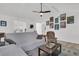 Spacious living room featuring a neutral color palette, wood floors, and high ceilings at 303 Gippy Dr, Summerville, SC 29486