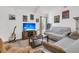 Cozy living room with a comfortable seating arrangement, accent rug, and bright white walls at 303 Gippy Dr, Summerville, SC 29486
