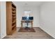 Office space with light wood floors, natural light, desk, and shelving at 303 Gippy Dr, Summerville, SC 29486