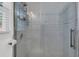 Modern bathroom shower with tile surround, glass door, and rainfall shower head at 303 Gippy Dr, Summerville, SC 29486