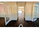 Hallway with open doorways leading to other rooms at 305 Sandridge Rd, Dorchester, SC 29437