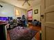 Cozy bedroom featuring hardwood floors, two windows, and closet at 306 Perry Rd, Walterboro, SC 29488