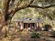 Charming brick home with mature trees and a well-manicured lawn at 306 Perry Rd, Walterboro, SC 29488