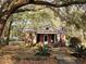 Charming brick home with mature trees and a well-manicured lawn at 306 Perry Rd, Walterboro, SC 29488
