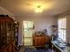 Open-plan living room featuring wood floors with built-in bar at 306 Perry Rd, Walterboro, SC 29488