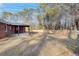 Expansive backyard with a well-maintained lawn and a privacy fence at 313 Runnymede Ln, Summerville, SC 29485