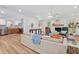 Bright living area with hardwood floors, a fireplace, and plenty of space for entertaining at 313 Runnymede Ln, Summerville, SC 29485