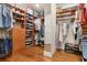 Walk-in closet offering ample shelving, drawers, and clothing racks at 32 Prioleau St # N, Charleston, SC 29401