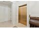Interior elevator with gold door and bright white trim at 32 Prioleau St # N, Charleston, SC 29401