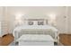 Bright bedroom with neutral tones, wooden floors, and comfortable furniture at 32 Prioleau St # N, Charleston, SC 29401