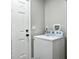 Bright laundry room with neutral walls, door, and a modern washer and dryer set at 33 Athens Ct, Charleston, SC 29403