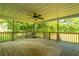 View of a partially covered porch featuring a ceiling fan and grill at 3596 Walter Drive Dr, Johns Island, SC 29455