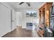 A neatly arranged room with nice wood floors and natural light, perfect for use as a comfortable bedroom or a home office at 402 Corey Blvd, Summerville, SC 29483