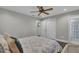 Bright bedroom with wood-look floors, large closet, and access to en-suite bathroom at 402 Corey Blvd, Summerville, SC 29483