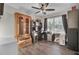 Comfortable bedroom with hardwood floors, ample storage, a ceiling fan and natural light, creating a relaxing atmosphere at 402 Corey Blvd, Summerville, SC 29483