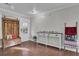 A welcoming foyer with hardwood floors, complemented by a rustic wooden bench and a stylish console table at 402 Corey Blvd, Summerville, SC 29483