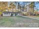 Charming one-story home with a well-manicured lawn and a driveway at 402 Corey Blvd, Summerville, SC 29483