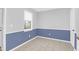 Dining area featuring stylish wainscoting, neutral paint and tile floors at 406 Crestview Dr # D, Summerville, SC 29485