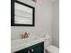 Bathroom featuring a white vanity, framed mirror and sleek fixtures at 425 Miami St # A, Ladson, SC 29456