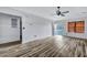 Spacious living room showcasing hardwood floors, neutral walls, and an open layout leading to other rooms at 425 Miami St # A, Ladson, SC 29456