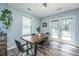 Bright dining area featuring a modern table and chairs near the doors to the outside at 425 Verbena Ave, Summerville, SC 29483
