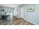Light-filled dining room with wood-look floors and access to the outdoor area at 425 Verbena Ave, Summerville, SC 29483
