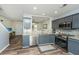 Well-equipped kitchen with stainless steel appliances, granite countertops, and dark cabinetry at 425 Verbena Ave, Summerville, SC 29483