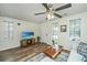 Cozy living room featuring contemporary decor, a ceiling fan, stylish furnishings, and lots of natural light at 425 Verbena Ave, Summerville, SC 29483