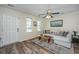Bright living room featuring modern decor, a comfortable sofa, stylish accents, and plenty of natural light at 425 Verbena Ave, Summerville, SC 29483