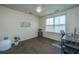 Bright office with a large window, a desk, and plants, creating an inspiring workspace at 425 Verbena Ave, Summerville, SC 29483