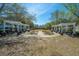 A park area with shade coverings and landscaping surrounding benches and walkways at 425 Verbena Ave, Summerville, SC 29483