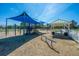 Community playground featuring a slide, climbing structures, and covered picnic area at 425 Verbena Ave, Summerville, SC 29483