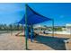 Fun playground featuring slides and climbing equipment, set against a backdrop of lush trees at 425 Verbena Ave, Summerville, SC 29483