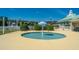 Shallow splash pad with mushroom fountain, seating, and a clear blue sky at 425 Verbena Ave, Summerville, SC 29483