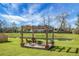 Backyard deck with seating area and scenic pond view, perfect for relaxation at 436 Blue Elderberry, Moncks Corner, SC 29461
