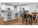 Kitchen and dining area with stainless steel appliances and a breakfast bar at 436 Blue Elderberry, Moncks Corner, SC 29461