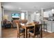 Open concept living and dining area with stylish furniture and finishes, creating a welcoming atmosphere at 436 Blue Elderberry, Moncks Corner, SC 29461