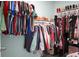 Well-organized walk-in closet with clothes and shoes on shelving and hanging racks at 436 Blue Elderberry, Moncks Corner, SC 29461